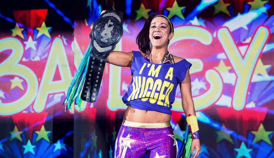WrestlingWCC's tweet image. Bayley’s new shirt includes some similarities to her classic Hugger shirt 🔥