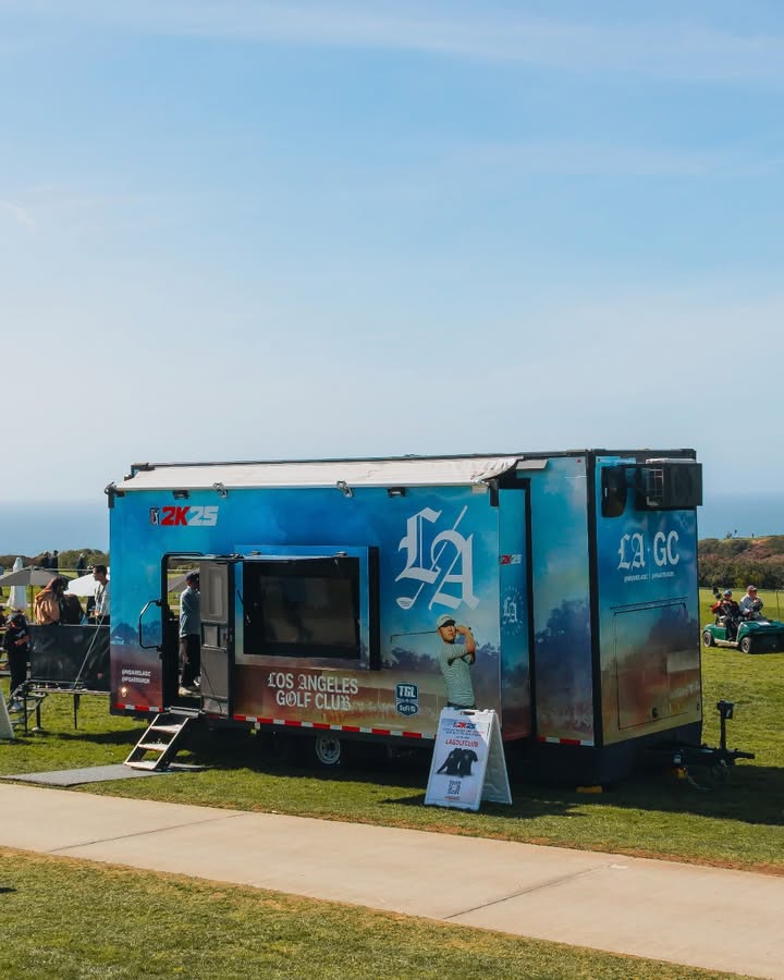 WeAreLAGC's tweet photo. Shout out to everyone who stopped by the @PGATOUR2K x LAGC booth on Torrey Pines hole 17 to take on our Closest-to-the-Pin Challenge on site at The Genesis Invitational last weekend.
Participants had a chance to win an exclusive #PGATOUR2K25 x #LAGC headcover in our @dryvebox that we retrofitted into a gamaing lounge. We got to witness an epic ACE by our guy Ryan that won him a twosome at Riviera Country Club.
PGA TOUR 2K25 is available for Early Access starting tomorrow. Use locker code LAGOLFCLUB in-game or in the First Look demo to get LAGC gear.