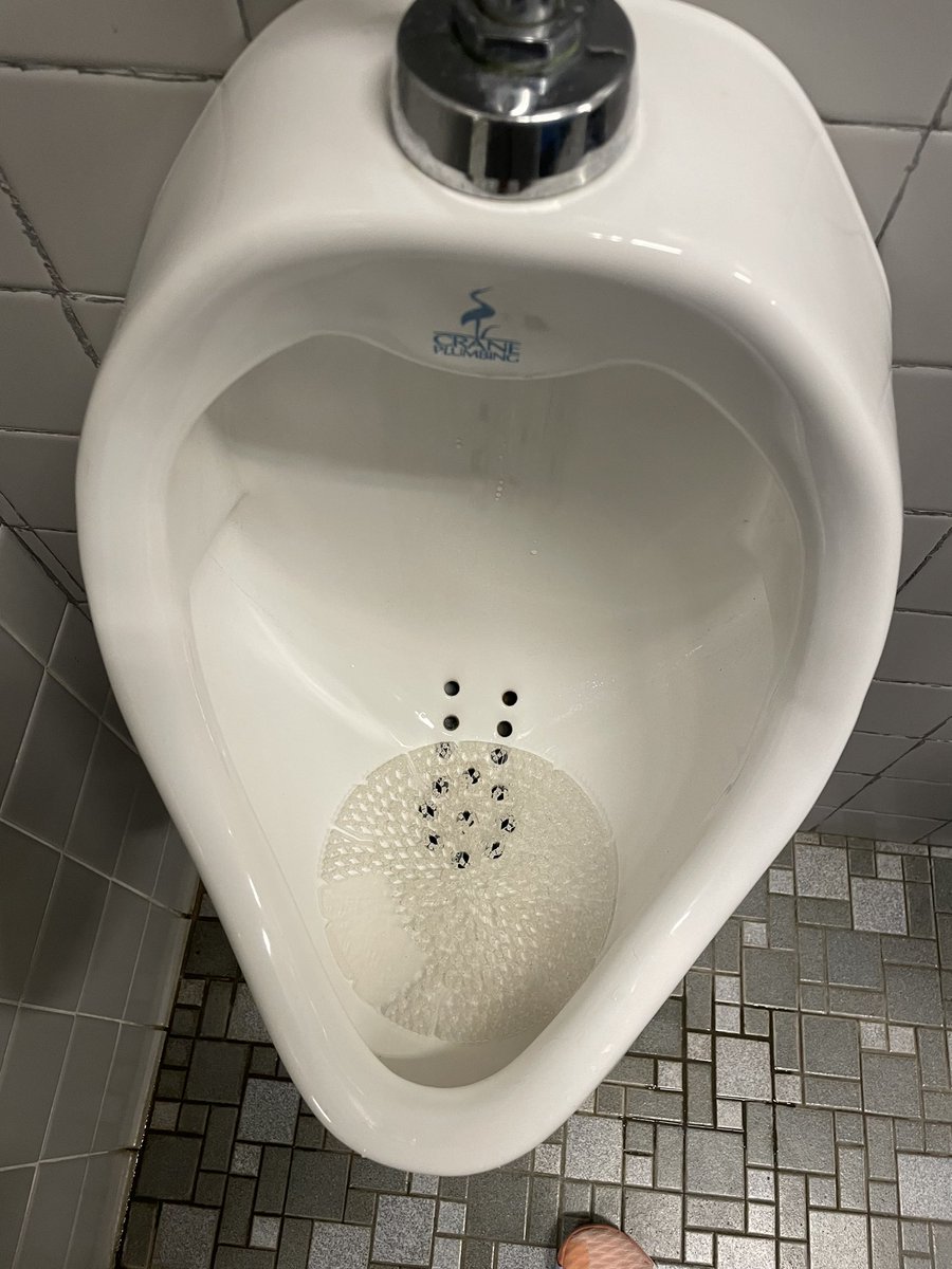 big_man_abe's tweet photo. Love it when a urinal has something to aim for like these holes #curryrange #whiteboywinter https://t.co/c8E5HSfDi3