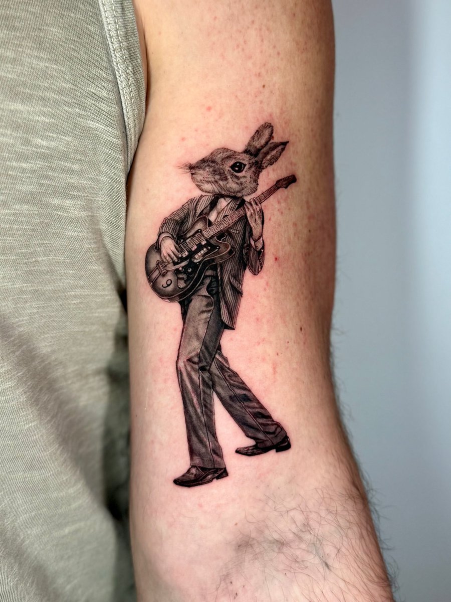 KaylynRhoad's tweet photo. tattooed a bunny playing the guitar 🐰🎸 https://t.co/VHEXVjH6Mc