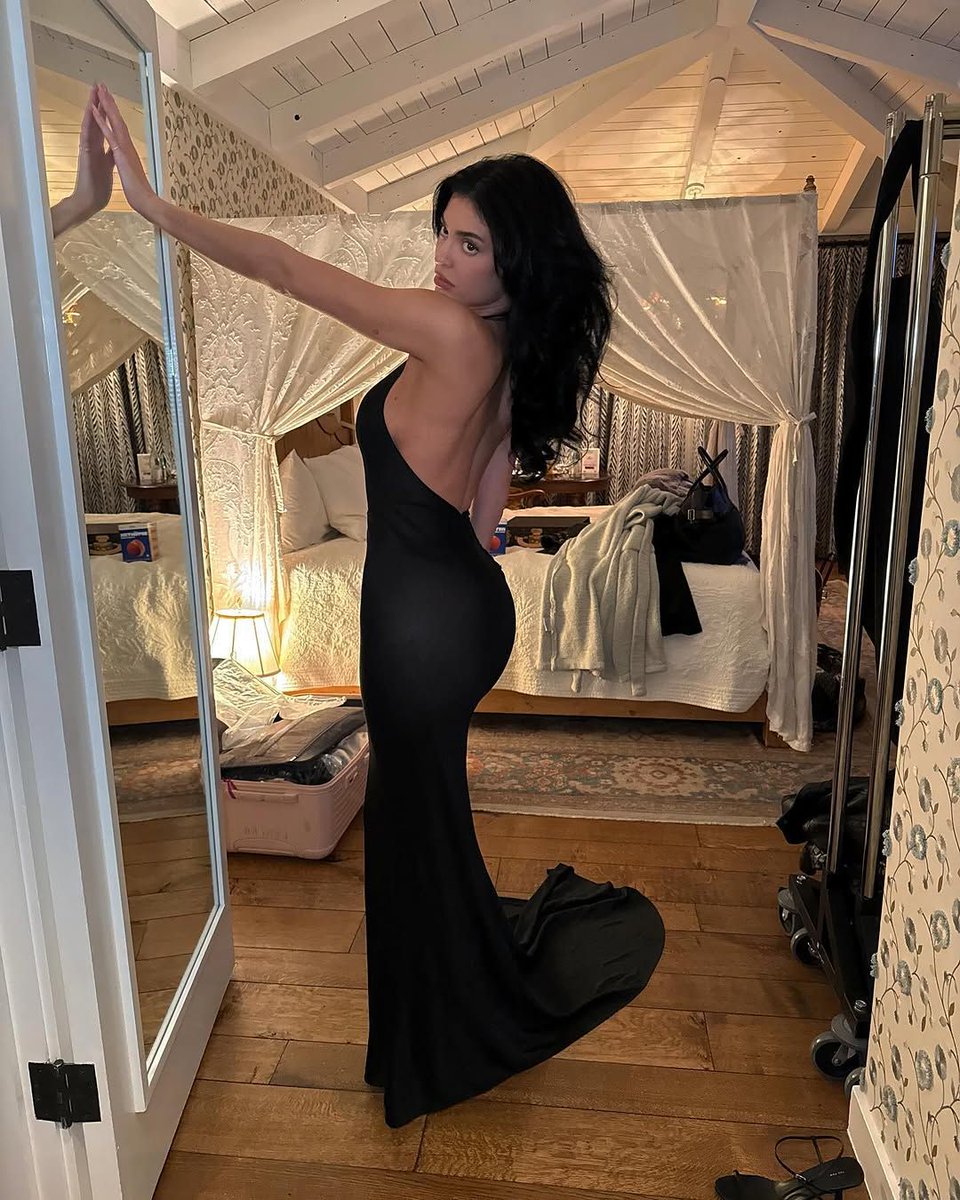 Kylie Jenner stuns in a classy, low-back black dress in photos recently  shared with fans.