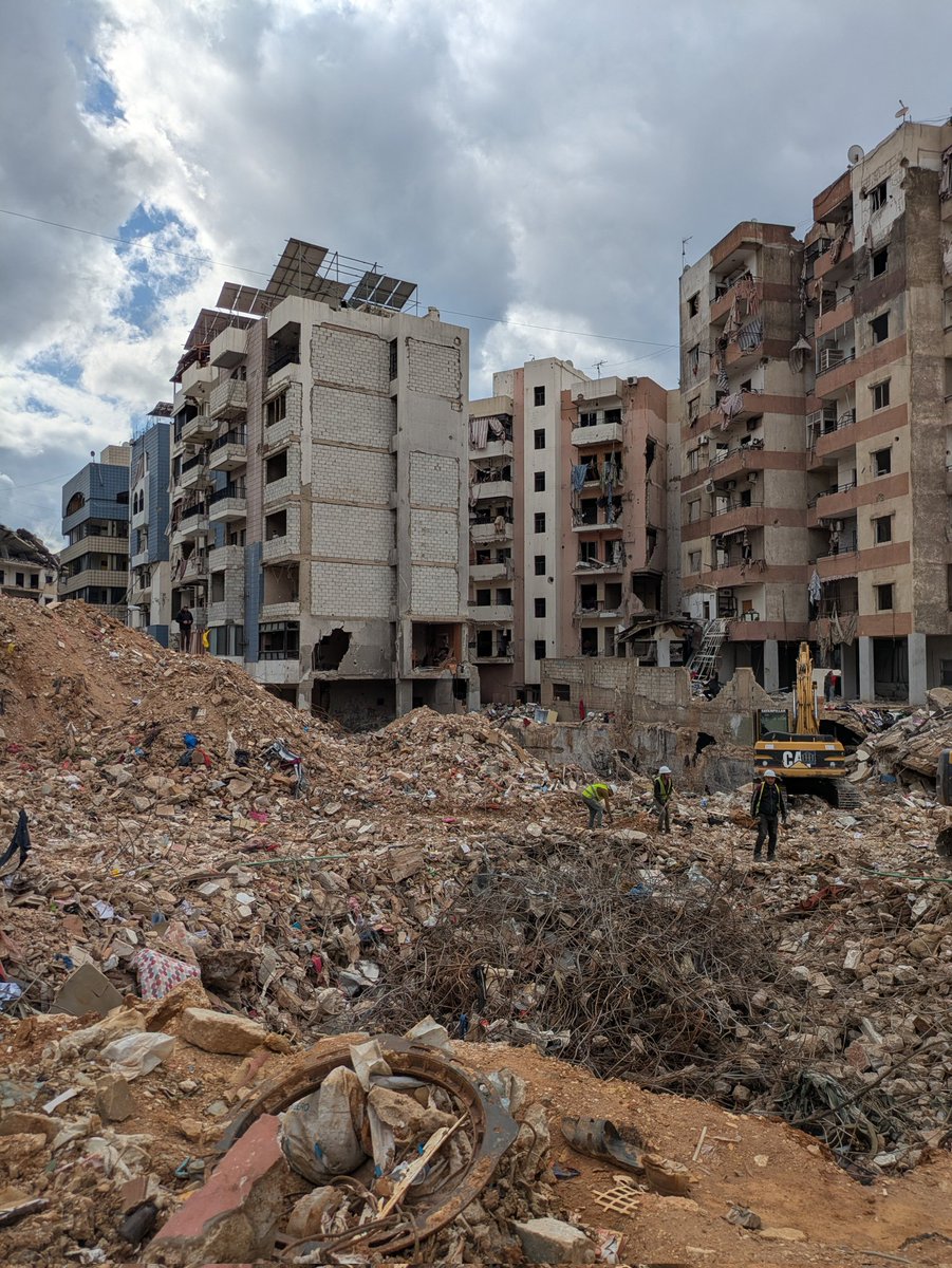 TaraAOGrady's tweet photo. One of the men I interviewed arrived to the scene ten minutes after the explosion and said that the ground had been like molten lava. 
The man in the photo with me was staring out over the detritus and told me "This was my home, everything is gone", https://t.co/dc1gSM473K
