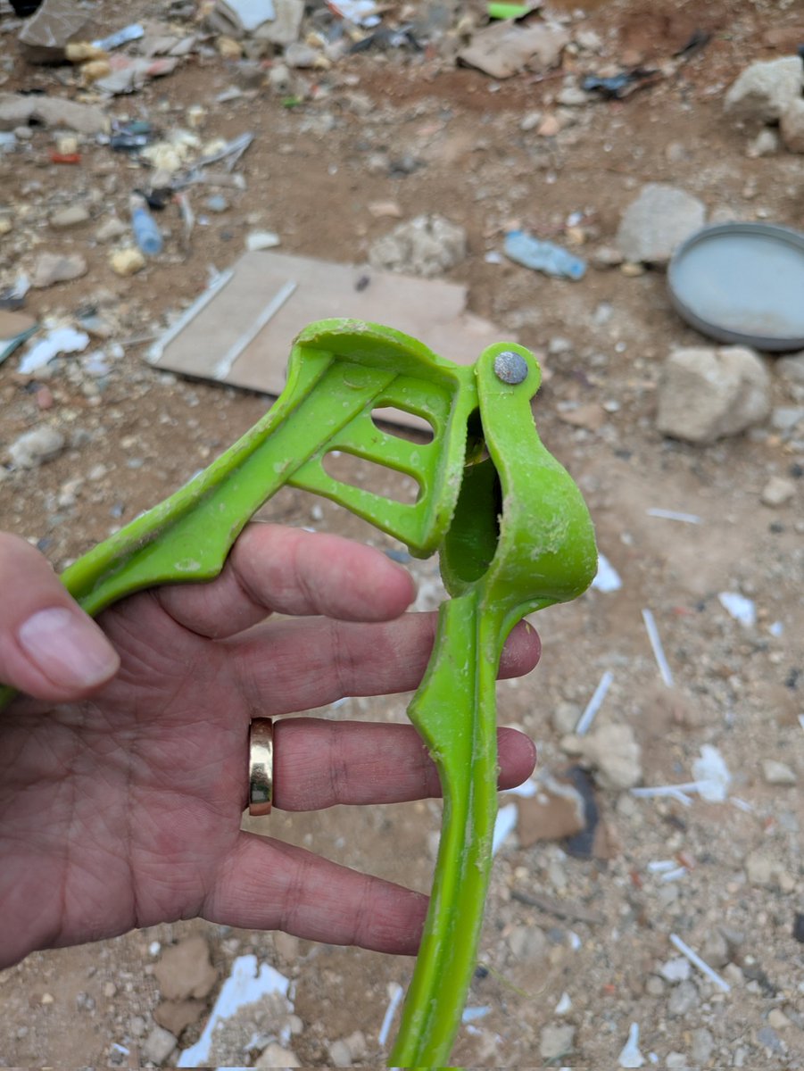 TaraAOGrady's tweet photo. meanwhile his wife handed me coffee from their flask. On the ground there are broken pieces of lifes accoutrement; childrens school books, shoes, scraps of clothing, broken toys and kitchen utensils. 
#Beirut
#Nasrallah
#Lebanon #Libnan https://t.co/rLcba2eqb4