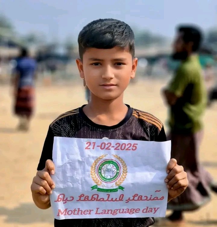 peace206998's tweet photo. Our mother tongue is more than just words—it carries our history, culture, and identity. As Rohingya refugees, preserving our language is our duty, for without it, we risk losing the last piece of who we are.
#ProtectOurLanguage #RohingyaIdentity
Photographer: @msrezaul21 https://t.co/p8sMUkUtcg