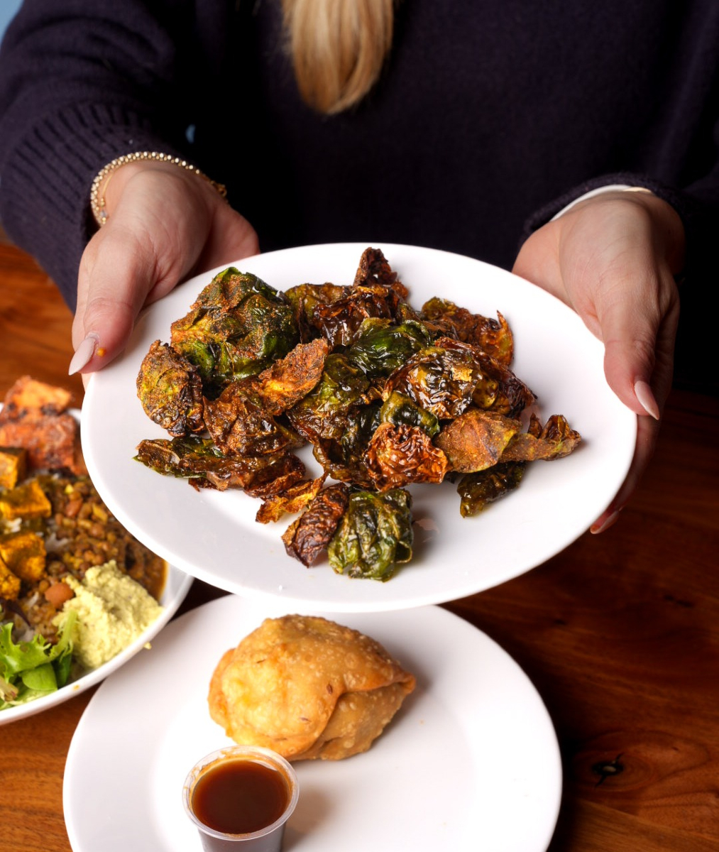 Try our Brussels Sprouts! They are tossed with coriander, cumin, and mom's secret fry seasoning and are bursting with flavor! Try them for a limited time at any of our three locations😋
