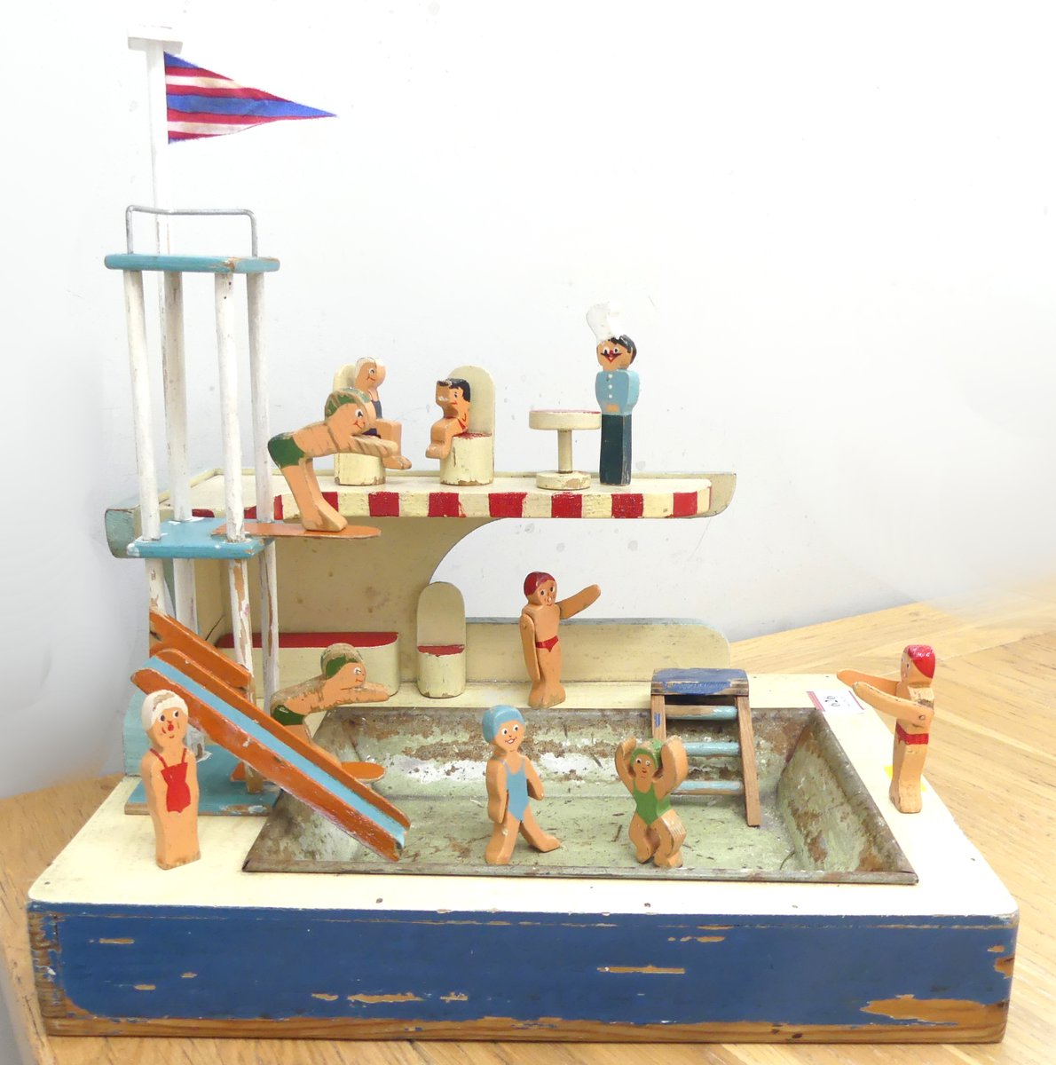 LacyScottKnight's tweet image. Dive into tomorrow's 1200-lot Home & Interiors auction by bidding on this gorgeous early 20th century wooden model of lido with bathers and diving board shorturl.at/jeUC6 #antiques #auction