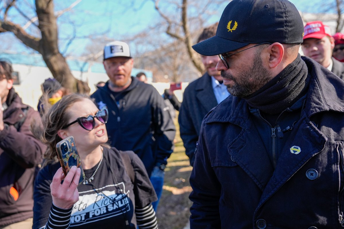 jengolbeck's tweet photo. There were a few protesters at the Proud Boys / Oath Keepers / J6 event at the Capitol today. This woman changed through their press conference, followed them around, called PB leader Enrique Tarrio a "pussy ass bitch", and stood in their group photo https://t.co/YqV3c0OnHZ