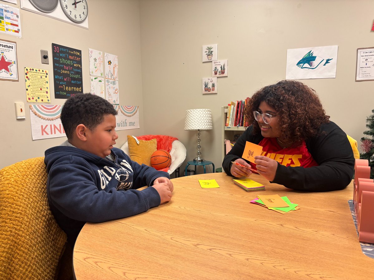Building confidence one word at a time! At Ebenezer Elementary, our Community School Coordinator is helping a student who is learning English strengthen their language skills through flash cards, sight words, and plenty of encouragement. 🙌#AllinforKids #BeingPresentMatters