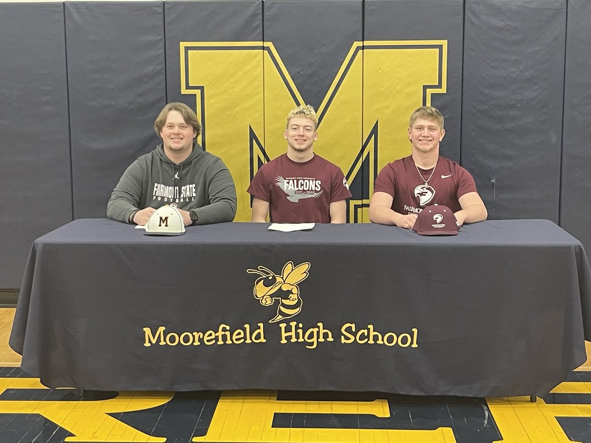 Fairmont State University triple signing is in the book for these Yellow Jackets:Riley Pillus &amp; EJ Wyman (Wrestling) &amp; Brody See (Football) ⁦<a href="/MFLD_Athletics/">Moorefield Yellow Jackets Athletics</a>⁩ ⁦<a href="/FairmontStateFB/">Fairmont State Football</a>⁩ ⁦<a href="/fsuwrestle/">Fairmont State Wrestling</a>⁩ ⁦<a href="/CoachPaulSee/">Paul See</a>⁩ ⁦<a href="/MattAltobello/">Matt Altobello</a>⁩ ⁦<a href="/scoony79/">Larry Schoonover</a>⁩