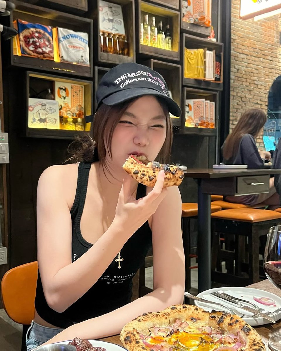 nibbling on a gooey slice of pizza, with cheese stretching like a little hug from the oven—pure bliss in every bite, and my heart’s doing a happy little dance! 😋🍕🍷