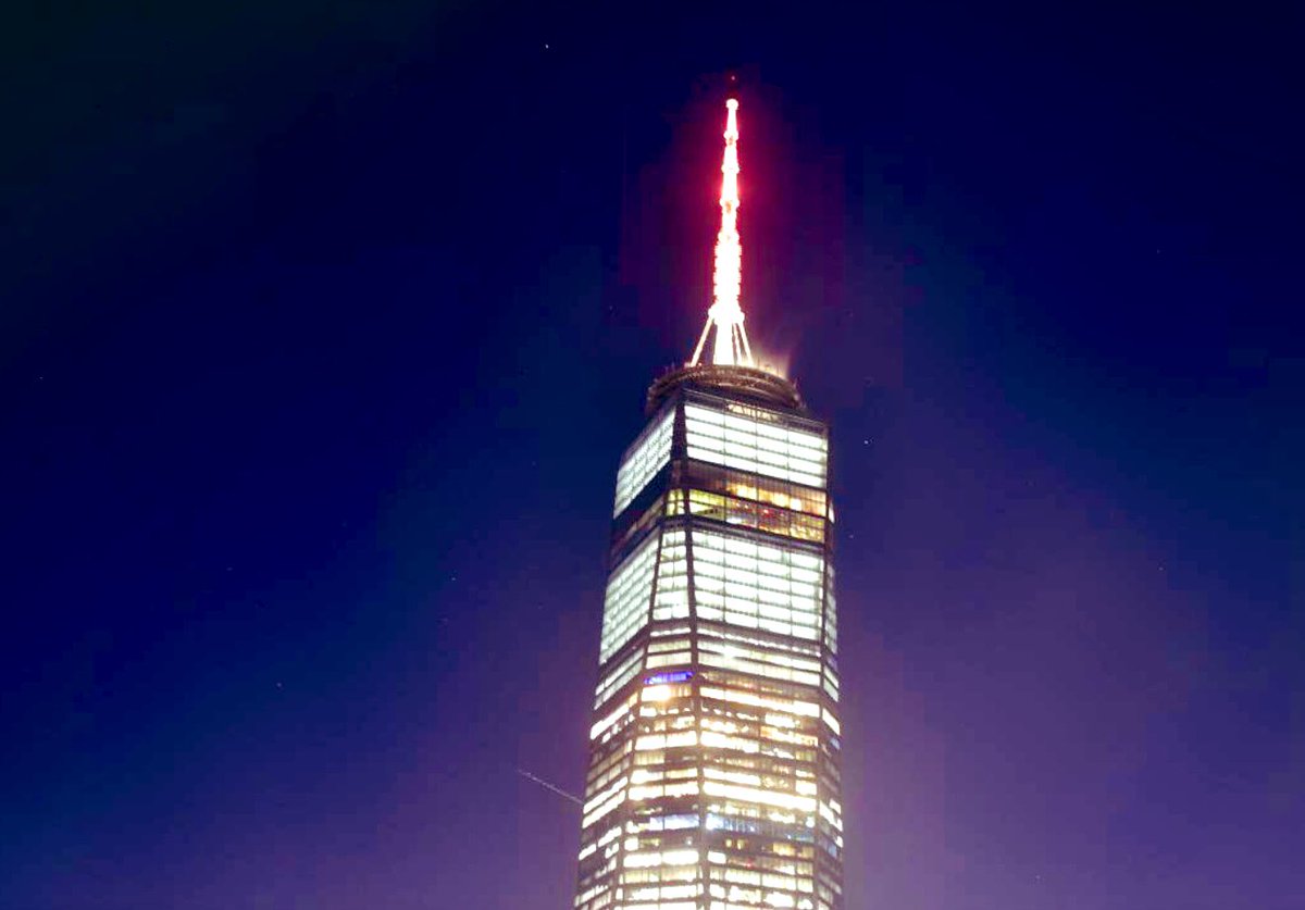 KatiaPorzo's tweet photo. Over a dozen New York landmarks are lit orange tonight to honor Ariel and Kfir #Bibas, including  the Freedom Tower (@OneWTC), Niagara Falls, the Mario Cuomo bridge, and the Kosciuszko Bridge. https://t.co/21dEF2uHuA