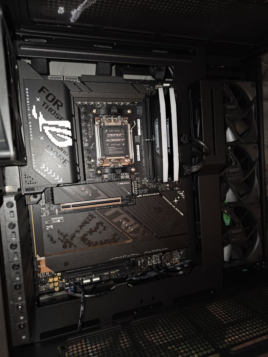 MagentaFink's tweet photo. Building a pc. Got the motherboard installed, the ram installed, one of the two hard drives under a very generous heat synch. Now just waiting for the graphics card I defeated a bunch of bots to get, and the processor. https://t.co/1oZJXe4GOK