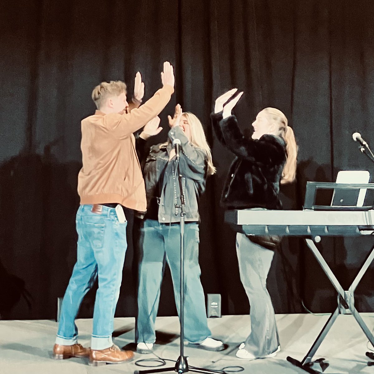 When 3 musicians hop on stage together and attempt a song that none of them know well…the only way to end it is a group high-five!