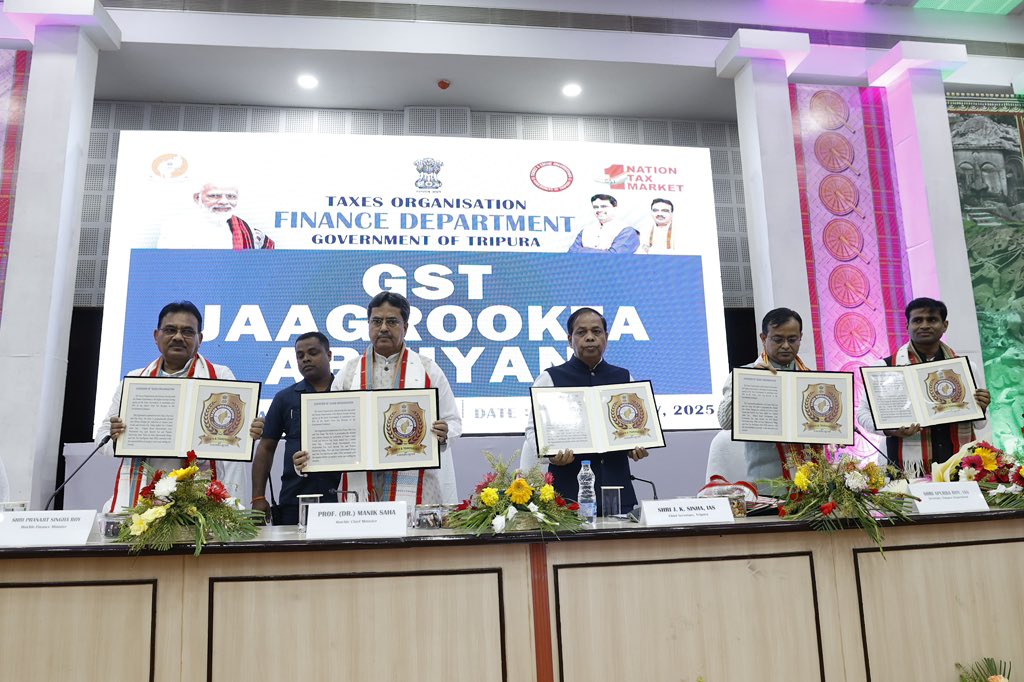 DrManikSaha2's tweet photo. The taxpayers are one of the main partners in development. Keeping this in mind, the Union Government led by Hon'ble PM Shri Narendra Modi ji introduced the GST in 2017. In this direction, the state government is also actively working to create a taxpayer-friendly environment through improved modern infrastructure and procedural simplification.

Today, inaugurated the GST awareness campaign and GST Knowledge Center at the Pragna Bhavan in Agartala, organized by the Tax Organization and State Finance Department. 

Also honoured prominent taxpayers and officials of the department & launched anti-fake registration campaign, unveiled new logo, and introduced the 'Kara Sathi' WhatsApp chatbot.
