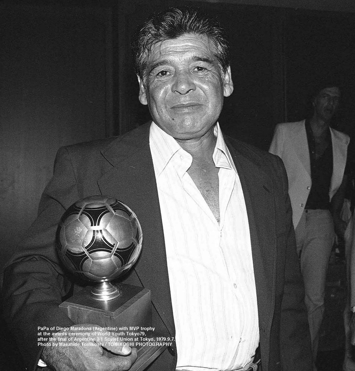 Papa of Diego Maradona (Argentina) with the MVP trophy 
at the awards ceremony of World Youth Tokyo79, 
after the final of Argentina vs Soviet Union3-1 
at Tokyo in Japan on 7 Sep 1979  
Photo by Masahide Tomikoshi / TOMIKOSHI PHOTOGRAPHY