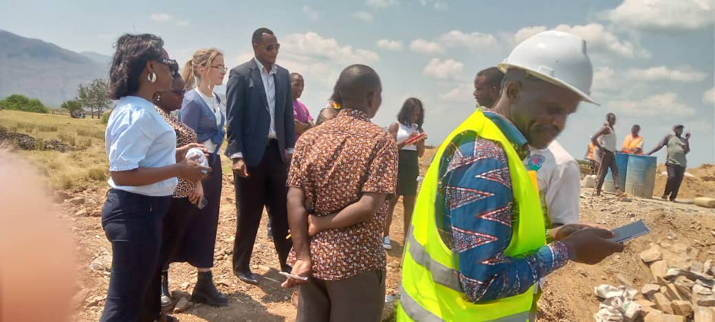 During monitoring of development activities, we usually do so with several stakeholders. Here, Comrade Angela Casey one of the Programme Directors  at the British High Commission shares her experiences with our district team and Engineers.
Ngarambe Muzeeyi
Dep RDC NTOROKO