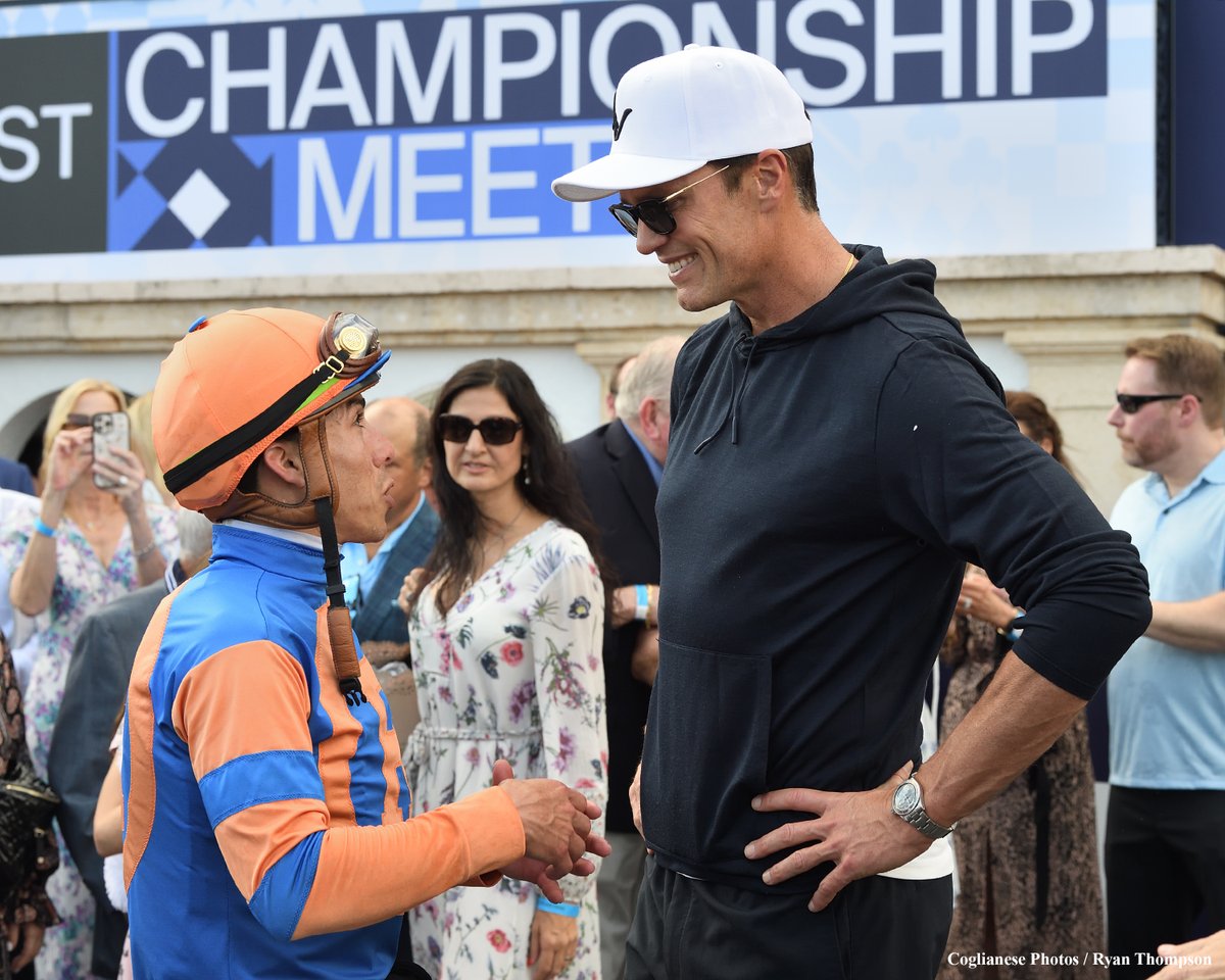 When champions meet under the Championship Meet sign.