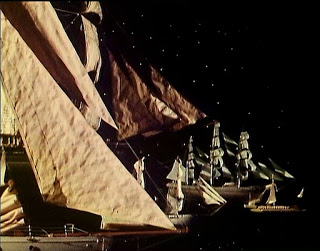 In a race that no-one must win, tonight’s phenomenal cliffhanger launches the story on a mightier scale:
“We’re not on a yacht – we’re on a ship. A spaceship”
Bringing The Temptation of Turlough / vampiric twist and Flying Dutchman / Black Guardian Trilogy to the finish