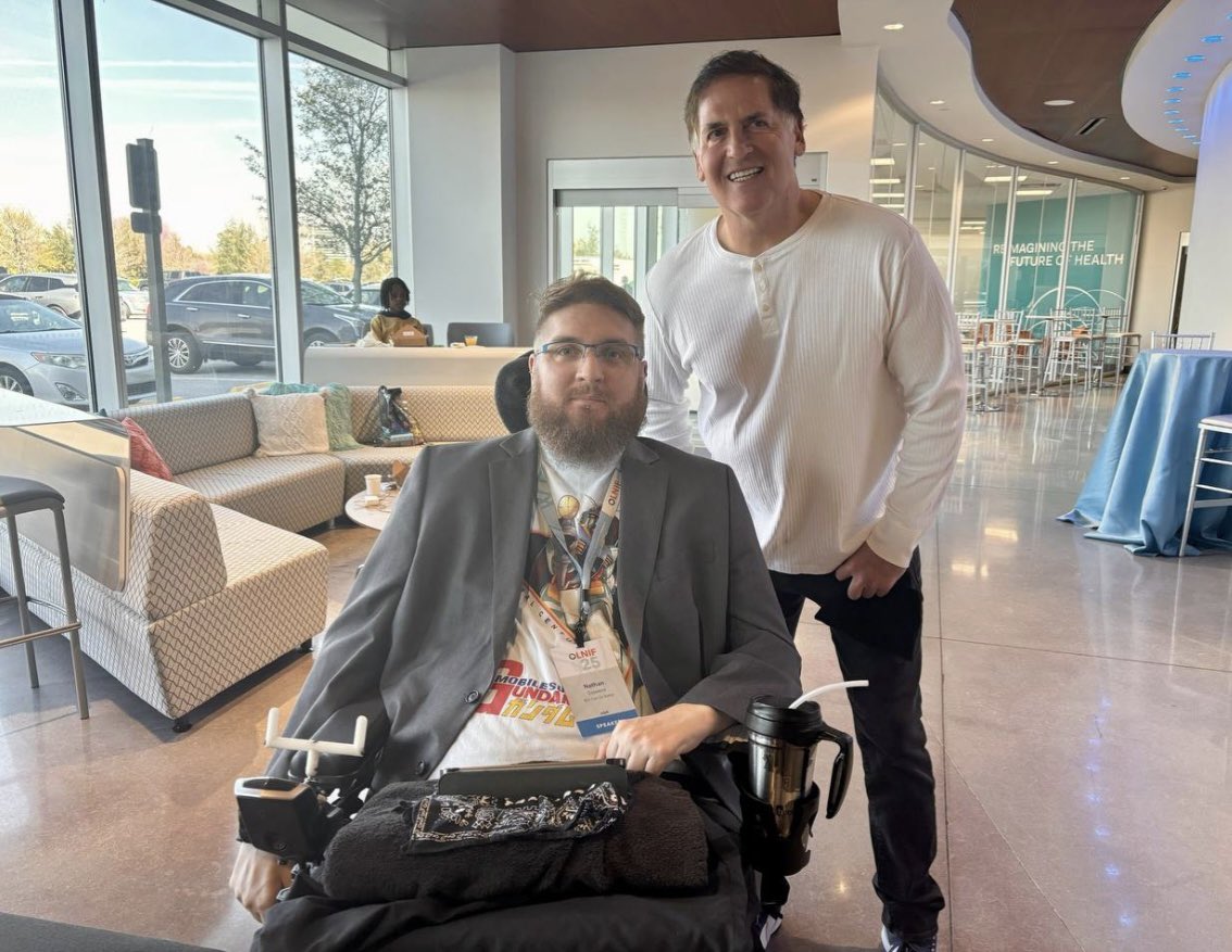 orchard123's tweet photo. Here’s cyborg Nathan Copeland @BCIcanDoBetter with @mcuban this week at @LNImpactForum helping the world by participating in BCI (Brain Computer Interface).  He made #Calicoin with his mind and BCI. @TheSharkDaymond @elonmusk @LoriGreiner. Support his meme movement $Calico https://t.co/IlIYKoVfPY