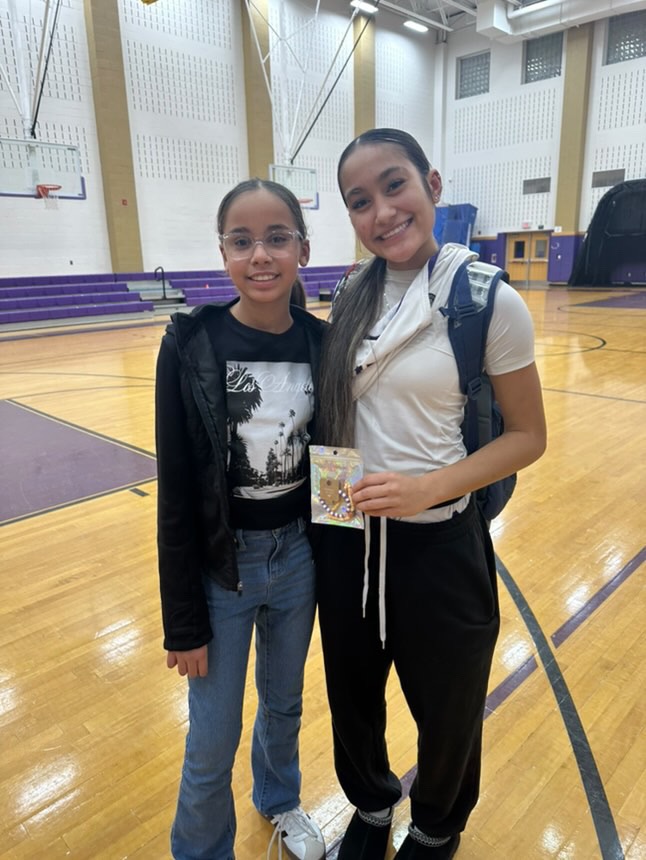 Post GMC final....this young lady waited to see E. Made E a bracelet in honor of her play. This is what basketball is all about. Inspiring others to be the best. Showing respect and passion for the game.