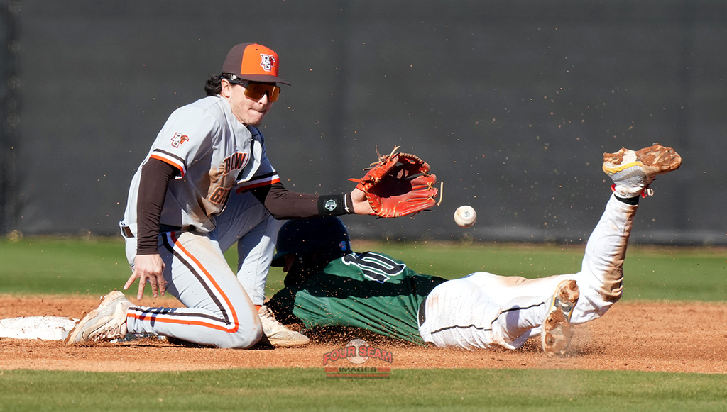 Shortstop Vance Sheahan (10) of the USC Upstate Spartans steals second base under the attempted tag of shortstop Gunner Antillon (41) of the Bowling Green Falcons on Friday, February 21, 2025, at Cleveland S. Harley Park in Spartanburg, S.C. (Tom Priddy/Four Seam Images)