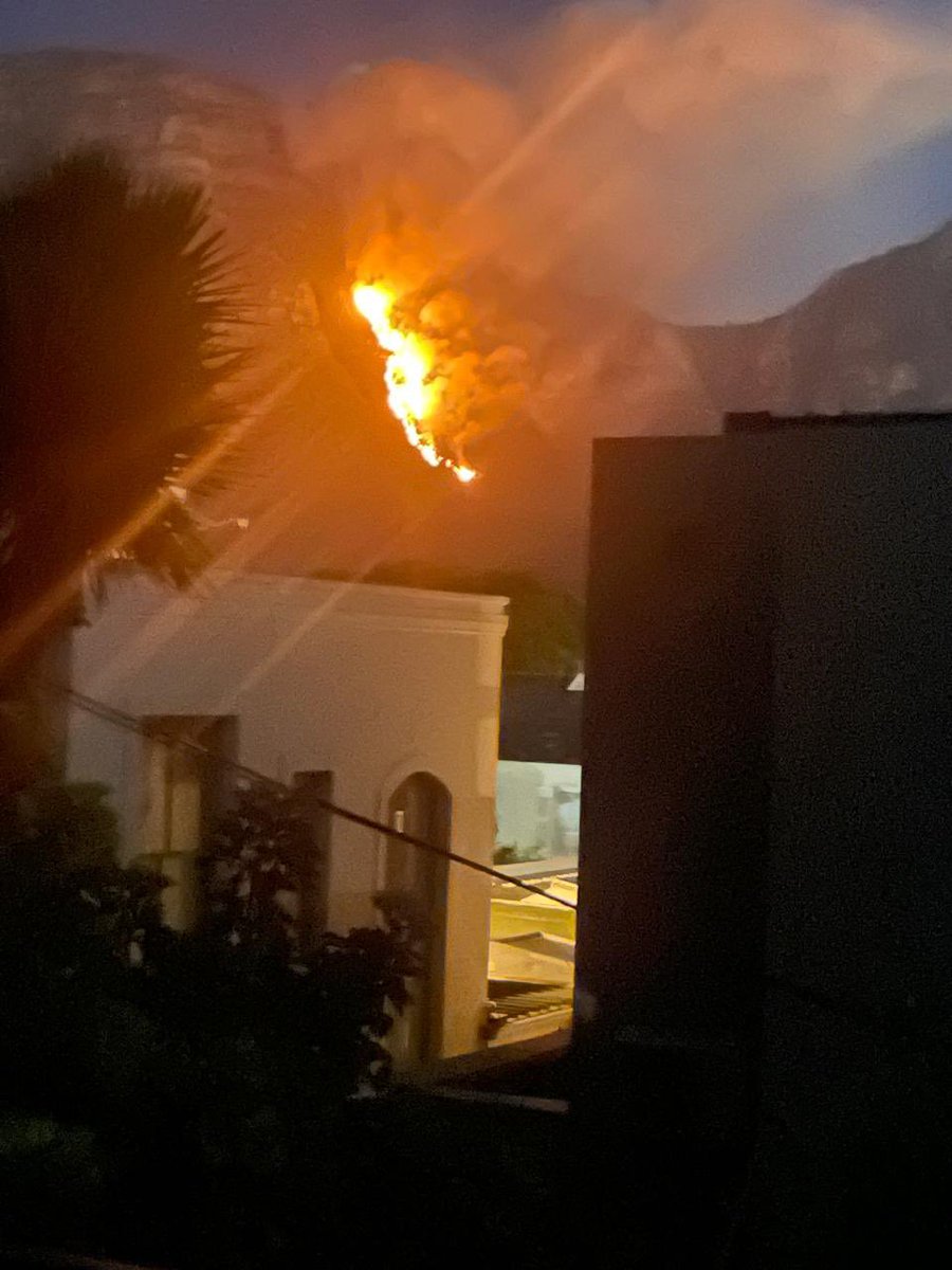 MikhailManuelCT's tweet photo. All Newlands and Kirstenbosch Mountain Trails are closed. 

50 fire fighters + Aerial support are battling the blaze that started at 3:40am

There is reasonable risk that the fire could spread to the back table, but the teams are doing everything possible to contain it. 

Follow for updates 

@cityofct 
@tablemountainnationalpark 
@vwsfires