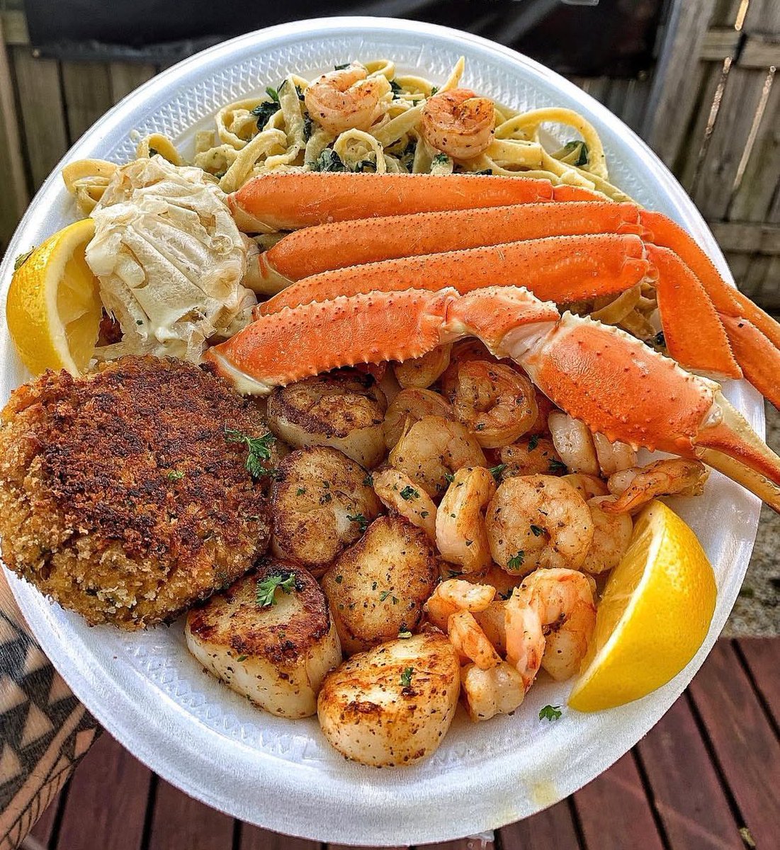 Seafood feast platter 🍋 !

~ Crab cakes 🦀 
~ Crab legs 🦀 
~ Scallops
~ Shrimp 🍤 
~ Seafood Alfredo 🍝