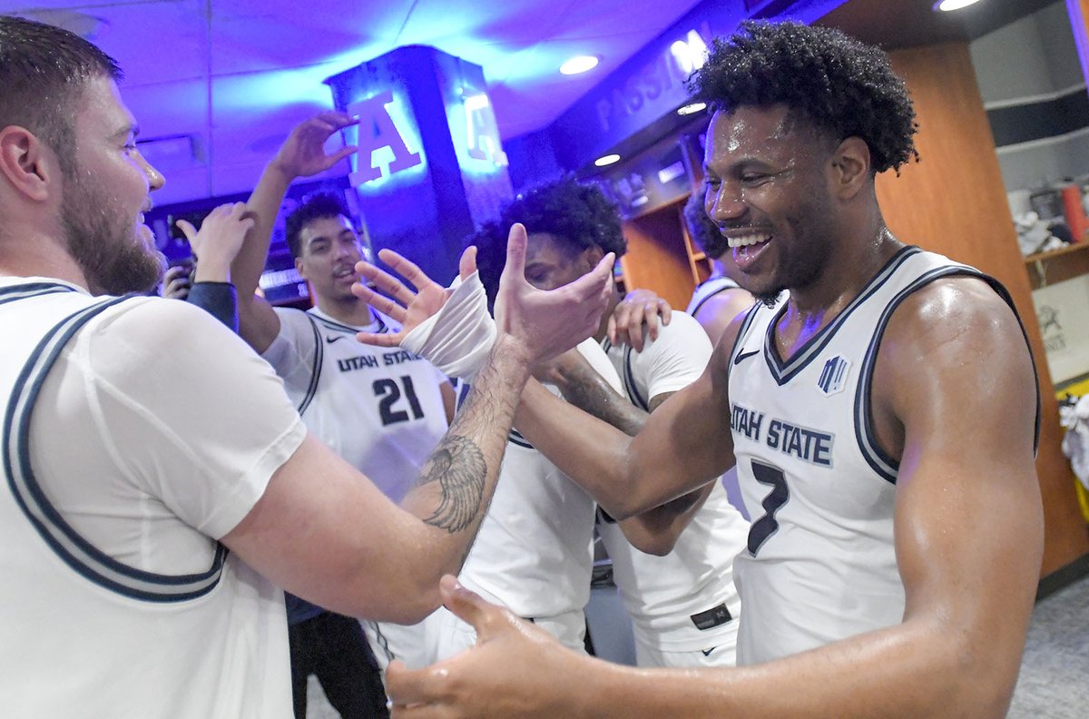 Utah State's Dexter Akanno leads the Aggies to a 79-71 victory against San Diego State on Saturday.  hjnews.com/multimedia/pho…