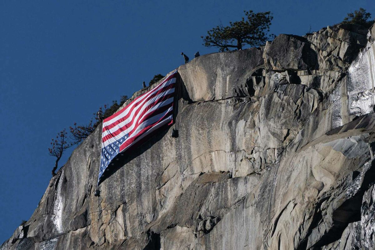 NewsWire_US's tweet image. Yosemite National Park workers hang &apos;distress flag&apos; amid protest over DOGE cuts — SFChronicle