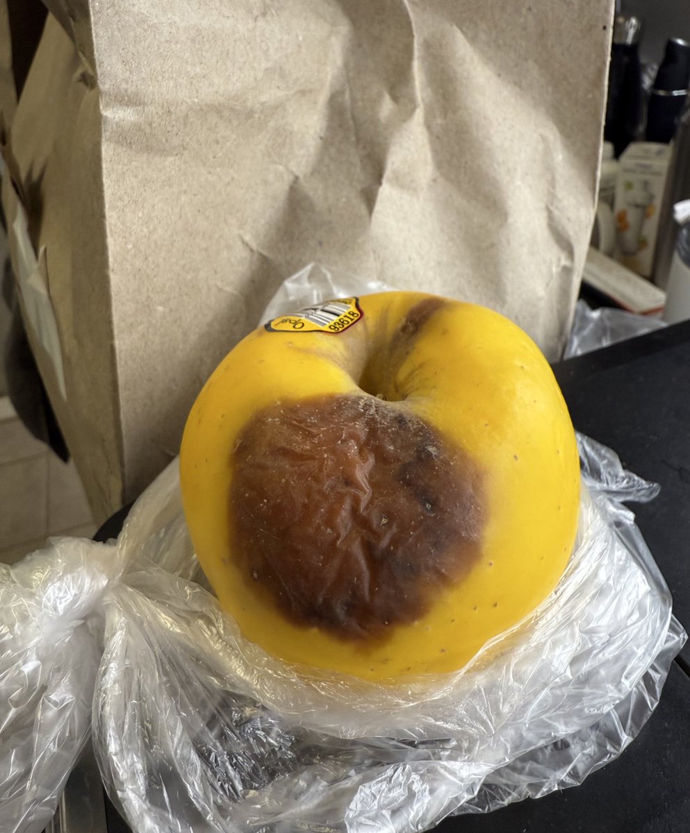 devondietlin's tweet photo. Just got my @AmazonFresh grocery delivery order. How the hell is this even remotely acceptable?? If you wouldn’t eat it, DON’T TRY TO SELL IT. I’m absolutely baffled at the thought of someone seeing this Apple and thinking it’s perfectly okay to package and sell to a customer. https://t.co/lmkmuA5p8m