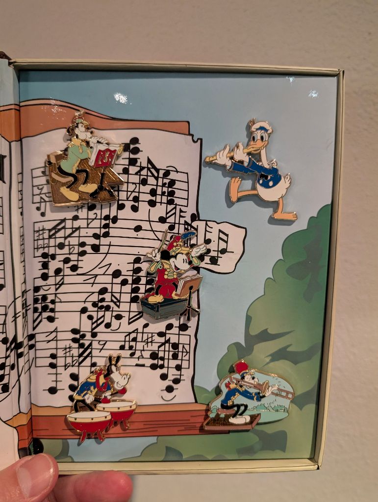 For the 90th Anniversary of "The Band Concert", I had to find my pin set of "The Band Concert" in this special box. Love how it looks #Ducktalk