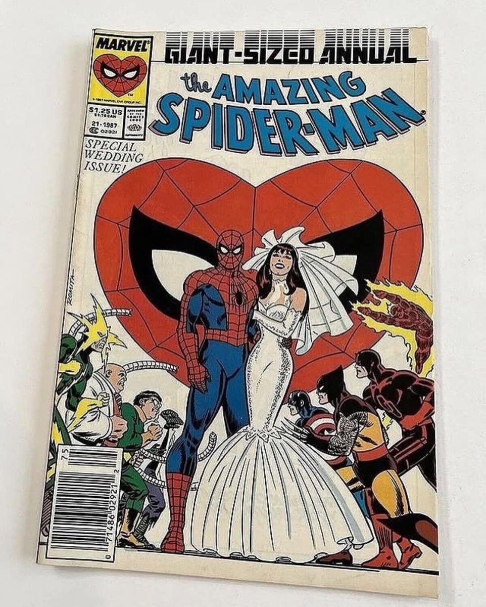 pedestrian's tweet photo. Spider-Man tied the knot and married Mary Jane in 1987. Stan Lee held a real-life wedding at Shea Stadium https://t.co/K87elxCt4r