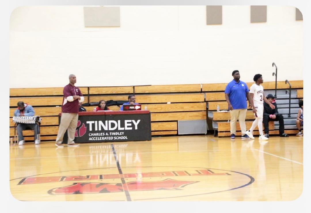 Can't imagine this happens often. Father (Marcel Bonds) vs. son (Austin Bonds) coaching junior varsity game between Tindley and Shortridge. Score one for the sons (Shortridge by 4).
