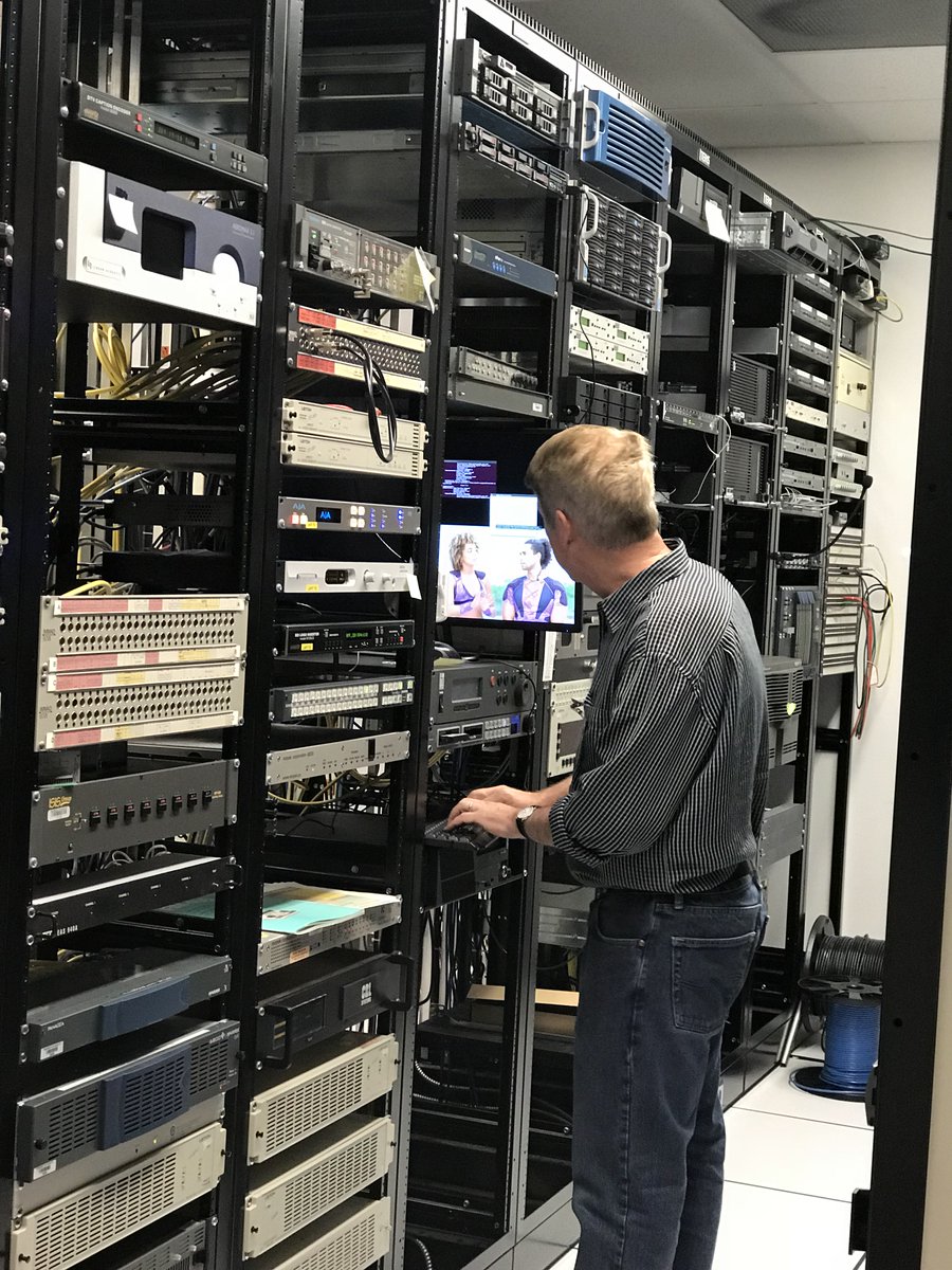 BoxZapper's tweet image. 💥A blast from the past!
In June 2018, we installed the first working prototype of ZapperBox at KNXV-TV in the Phoenix Model Market—you can see Paul Freeman, our VP of Engineering, installing a receiver in the station's equipment room.
#ZapperBox #Throwback #ATSC3 #NextGenTV #OTA