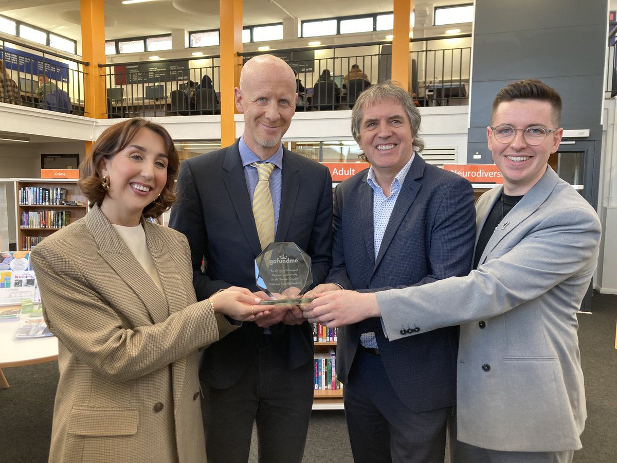 bbcmerseyside's tweet image. The CEO of @gofundme Tim Cadogan (2nd left) presents a plaque to @LCRMayor to congratulate the region as the most generous city in the UK for raising £250K to repair & restore #SpellowLibrary after last summer’s riots.Also in pic are @alexlouisemc and @harrydoyle96 @GoFundMeUK