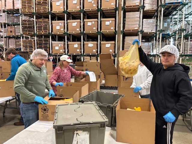 Chicago team members recently came together at the Greater Chicago Food Depository to help fight hunger in our #community. Our dedicated volunteers packed nearly 11,000 lbs. of food — that’s 9,145 meals for families in need!  #giveback <a href="/FoodDepository/">Chicago’s Food Bank</a>
