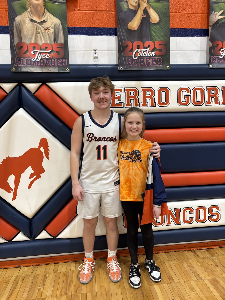 Maci wanted a pic with her senior buddy on his last game!   Fantastic careers for both Tyce and Brenden!