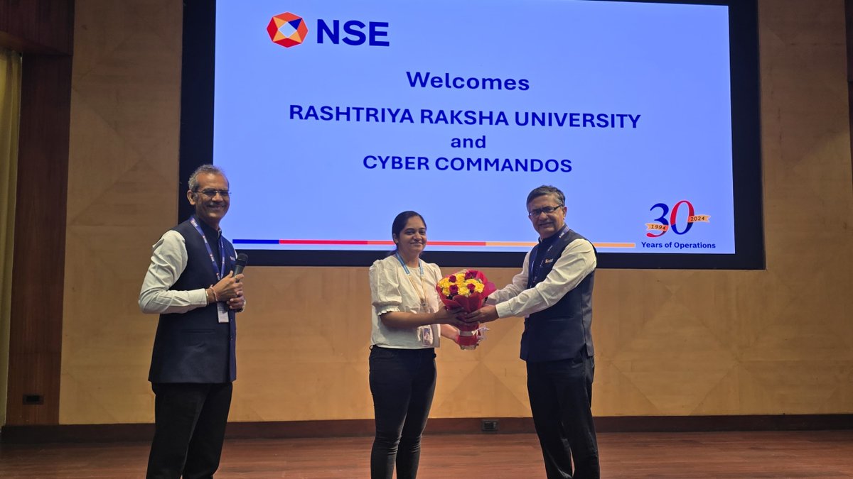 NSEIndia's tweet photo. Our MD & CEO, Shri @ashishchauhan, and our Chief Information Security Officer, Shri Rajesh Thapar, interacted with 27 police officers from various states across India, who are part of the Cyber Commandos Training Program, along with Rashtriya Raksha University (RRU) staff members, during their visit to the @NSEIndia HO today. 

#NSE #NSEIndia #VisitToNSE #CyberCommandos #TrainingProgram #RRU