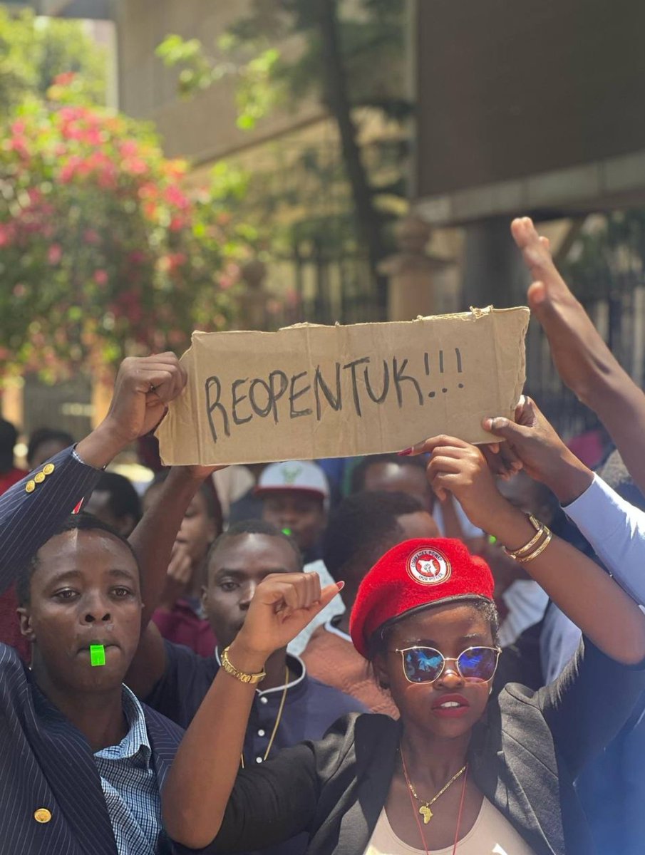 CUEA, led by their chair lady - Miss Faridah Kemunto (in red beret), stands with TUK as they protest over prolonged school closure due to staff strike.
