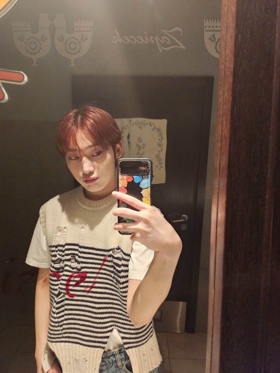 Missing pretty red hair Sunoo with torn sweater and colorful phone case :(