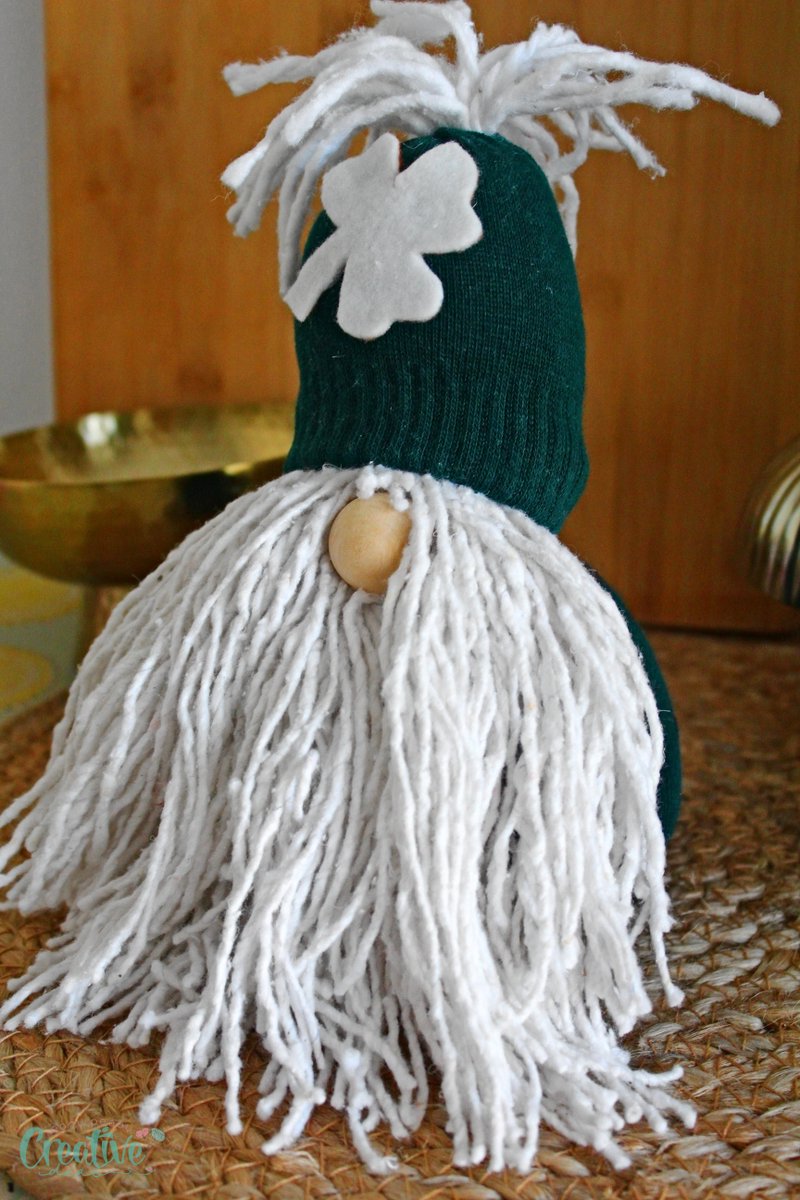 Celebrate #StPatricksDay with a fun and whimsical #craft, a St. Patrick #Gnome! This adorable #DIY #project is simple to make and adds a festive #Irish touch to your #homedécor. redtedart.com/diy-sock-gnome…