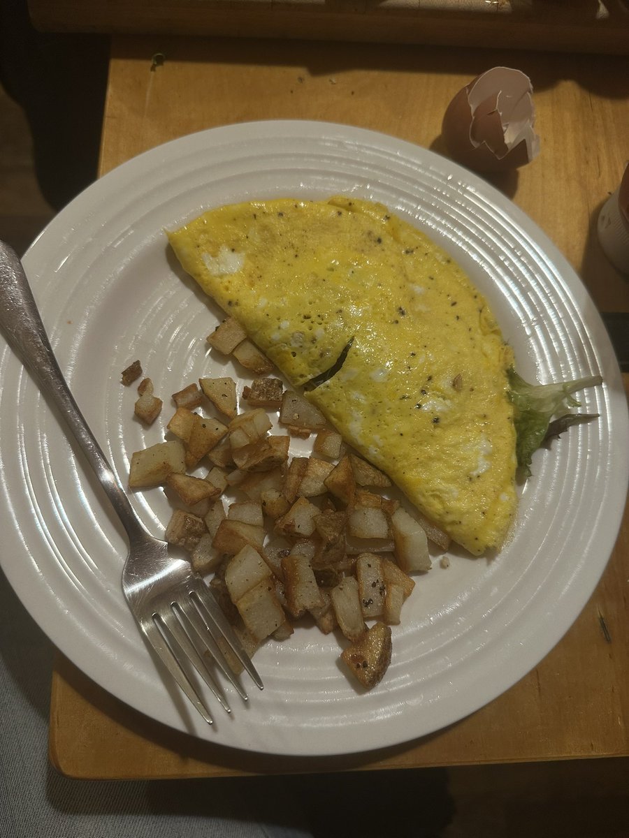 Omelette with mushrooms and cheddar cheese and greens and crispy potato’s at 3am!!! So perfect and beautiful