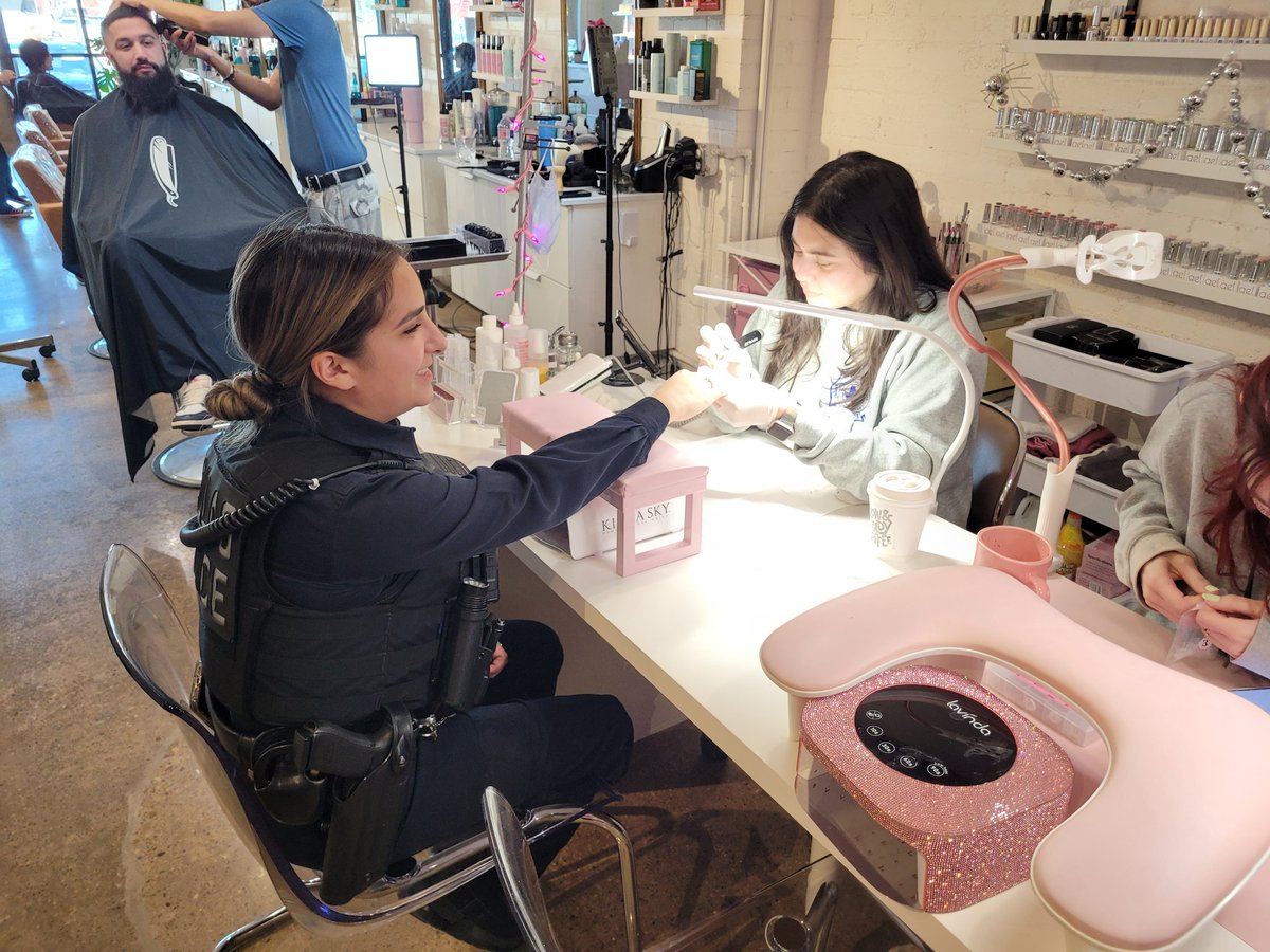 Nail shop talk at The Bloom Space in Southwest was a good way for members of the community to interact with Officer while getting their usual services.