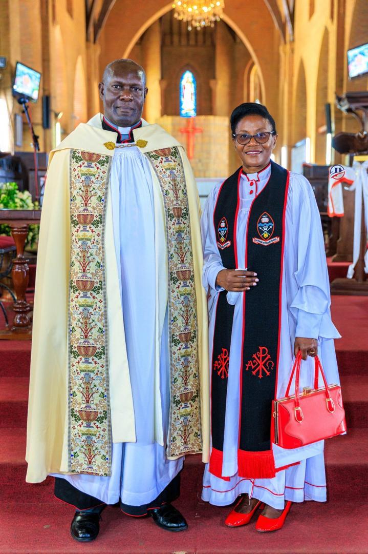 Namirembe Diocese (@bishopsvoice) on Twitter photo The Very Rev. Canon Dunstan Kiwanuka Mazinga and his dear wife Canon Lovincer after their installation at St. Paul's Cathedral Namirembe on Sunday.
<a href="/Archbp_COU/">Archbishop Stephen Kaziimba</a>
<a href="/ChurchofUganda_/">Church of Uganda</a>
<a href="/coufamilytv/">COU Family TV</a>
<a href="/NamirembeYouth/">Namirembe Diocese Youth Department</a>
<a href="/FathersUnion/">Fathers' Union-Church of Uganda</a>
<a href="/Mengo_School/">Mengo Senior School</a>
<a href="/St_Johns_Chapel/">St John's Chapel Mengo</a>
<a href="/FaithMaama/">Maama Faith Luwalira Foundation (MAFLF)</a> The Very Rev. Canon Dunstan Kiwanuka Mazinga and his dear wife Canon Lovincer after their installation at St. Paul's Cathedral Namirembe on Sunday.
<a href="/Archbp_COU/">Archbishop Stephen Kaziimba</a>
<a href="/ChurchofUganda_/">Church of Uganda</a>
<a href="/coufamilytv/">COU Family TV</a>
<a href="/NamirembeYouth/">Namirembe Diocese Youth Department</a>
<a href="/FathersUnion/">Fathers' Union-Church of Uganda</a>
<a href="/Mengo_School/">Mengo Senior School</a>
<a href="/St_Johns_Chapel/">St John's Chapel Mengo</a>
<a href="/FaithMaama/">Maama Faith Luwalira Foundation (MAFLF)</a>
