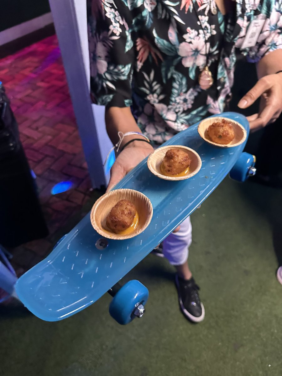 CATinPhoenix's tweet image. Tonight’s mixer had a kaleidoscope dance floor, glow in the dark popcorn, apps served on skateboards &amp;amp; a lit exit! #catersource