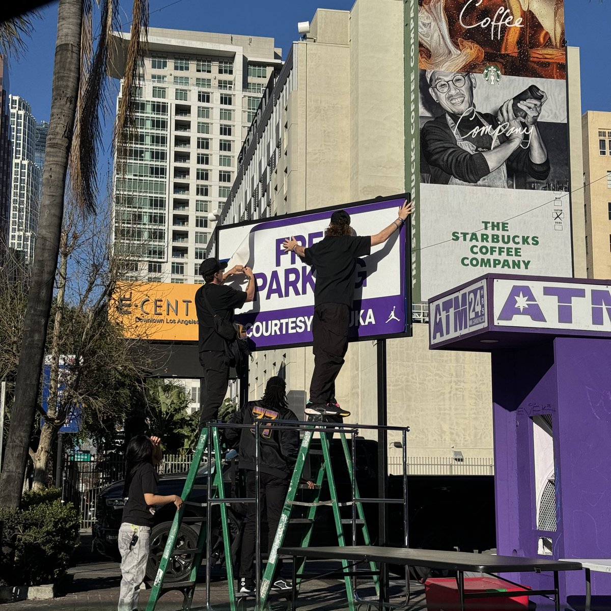 FredoCervantes's tweet photo. A sign is now up for FREE PARKING at tonight's game, courtesy of @luka7doncic and @Jumpman23

I have never seen a player purchase an entire parking lot for fans. Parking lot located across the street from Tom’s Sports Bar. #LakeShow https://t.co/NFMKDNL8Ll