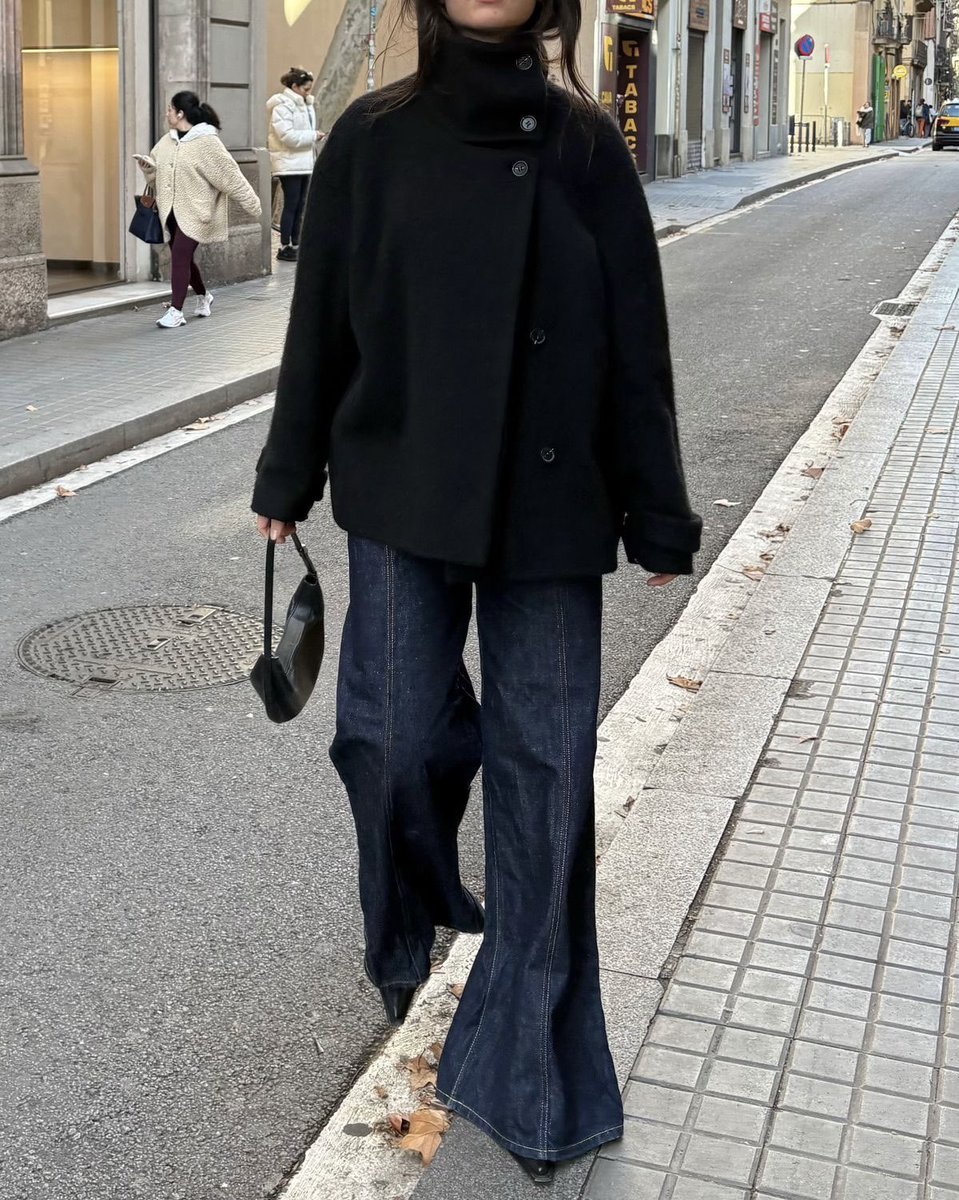 buttoned to the top....