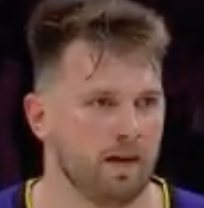 Luka Doncic stares down the Mavs bench after a triple. 

You know this is personal.
