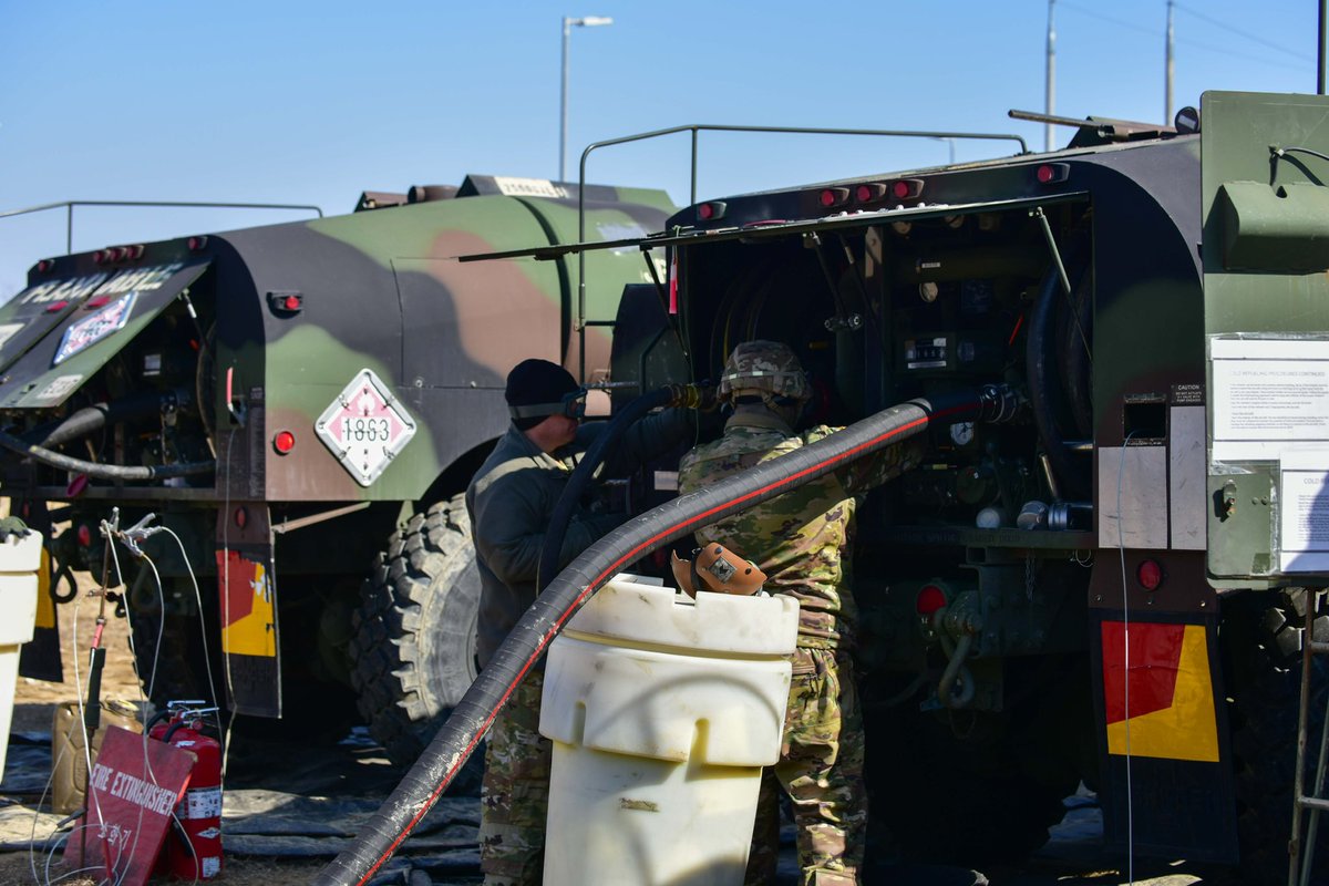 2INFDIV's tweet image. Soldiers from the 5th Squadron, 17th Cavalry Regiment, 2nd Combat Aviation Brigade, perform field maintenance on an AH-64 Apache at the Forward Arming and Refueling Point (FARP). The maintenance ensures the aircraft remains mission-ready.