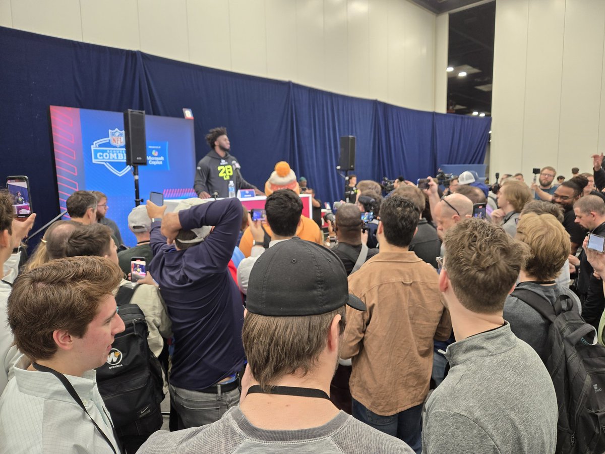 Lots of folks around Georgia edge rusher Jalon Walker. Potential top 10 pick.